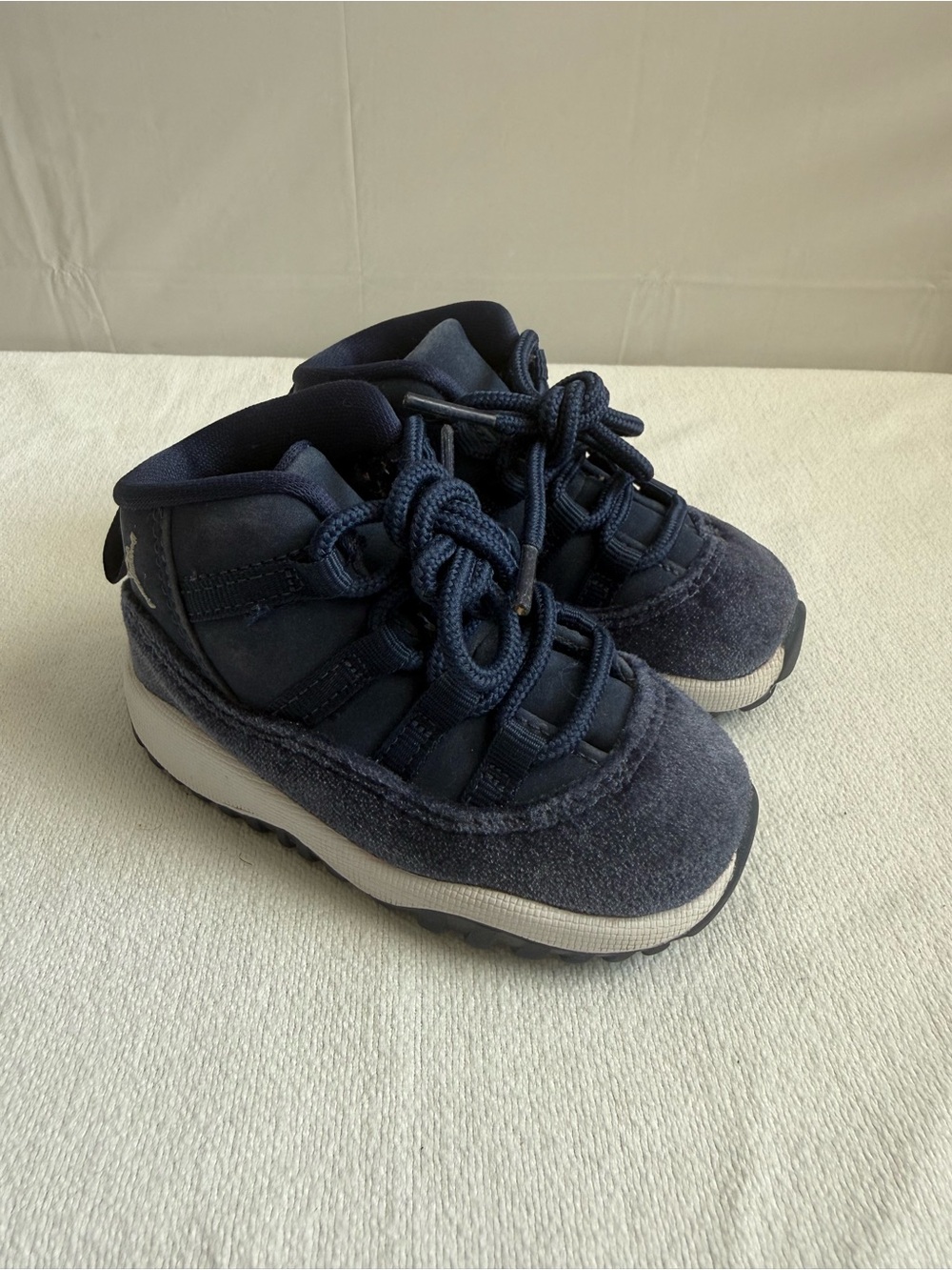 Air Jordan 11 Retro "Midnight Navy" toddler sneakers, size 5C.